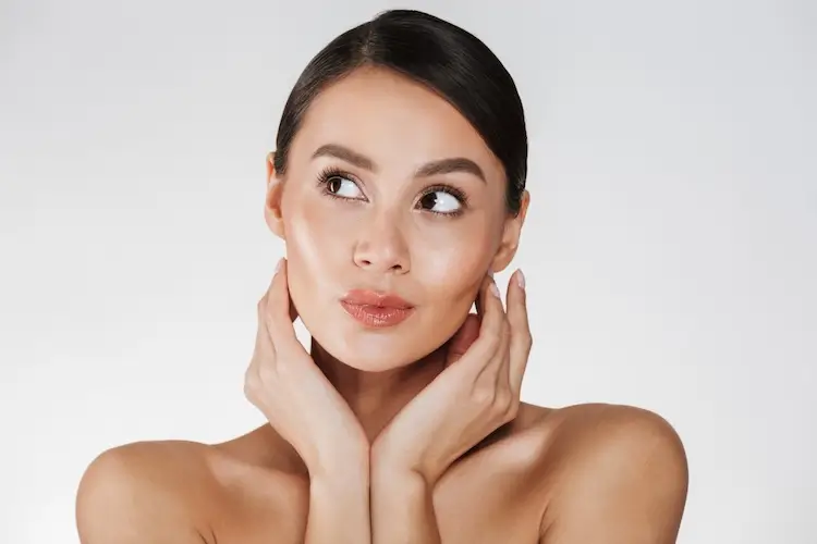 woman contemplating facelift before and after